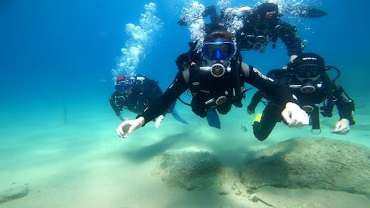 Scuba diving in Tossa de Mar with three-course meal