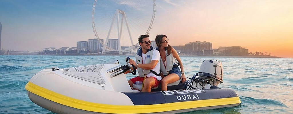 Dubai guided boat driving experience at sunset