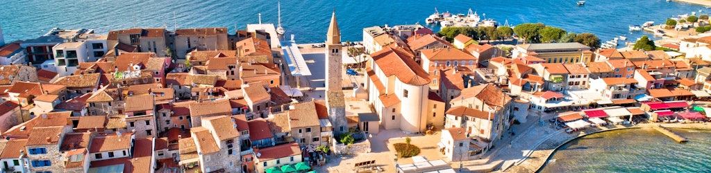 Whitewashed buildings facing the pristine waters of the Adriatic, Umag radiates elegance in all corners.