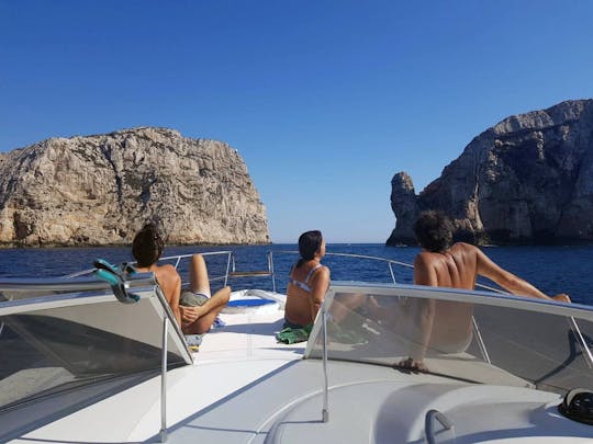 Escursione in barca di un'intera giornata lungo la costa di Alghero da Fertilia