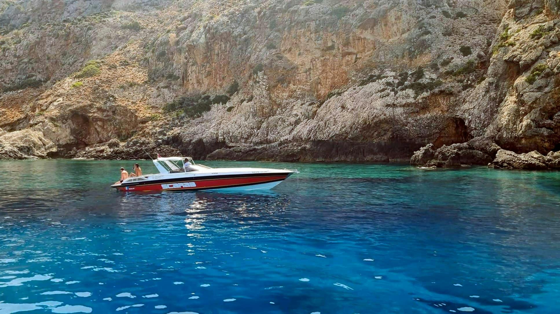 Half-day Menies Beach, Hironisia Bay & Theodorou Boat Cruise