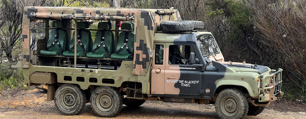 Open-air ex-Australian Army Land Rover used for Blue Mountains sightseeing tours