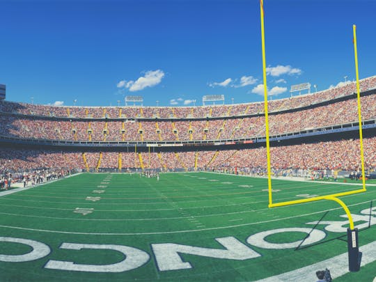 Denver Broncos football game ticket at Mile High Stadium