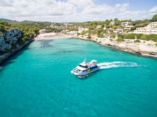 Barca con fondo di vetro Moonfish Gita di 3 ore con sosta per nuotare a Cala Morlanda