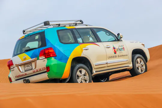 Morning Dubai Desert Safari with Camel Ride and Sand Boarding