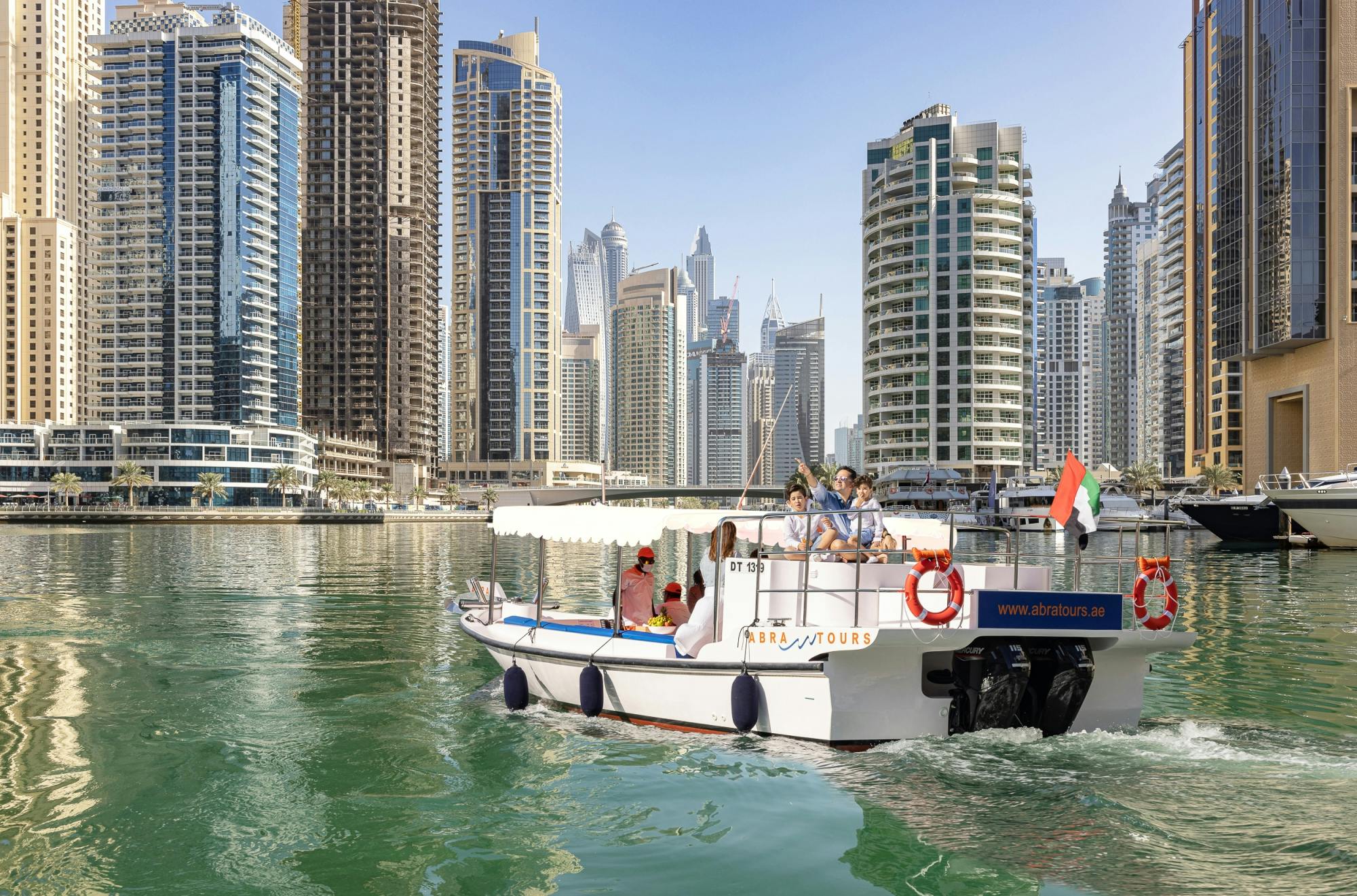 60 minute Modern Abra boat tour of Dubai Marina and Ain Musement