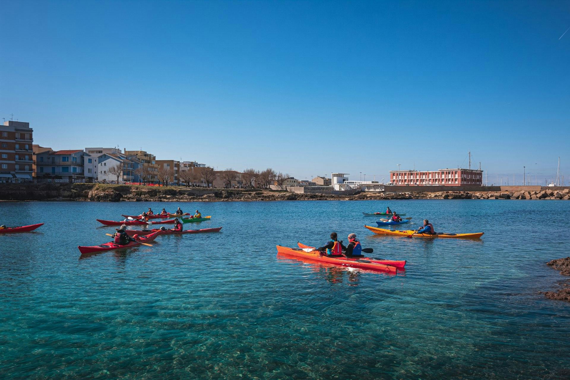 Guided Kayaking Excursion in Porto Torres Musement