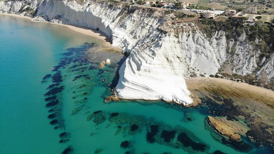 Excursão de bote de meio dia para Scala Dei Turchi saindo de San Leone