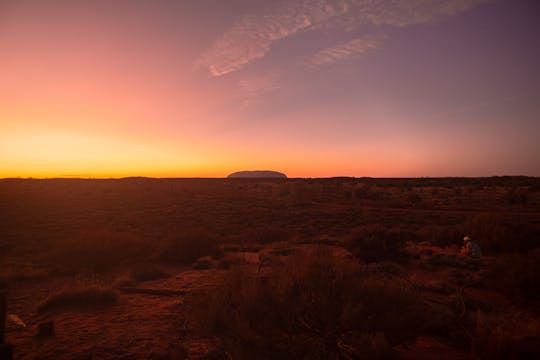 Locais sagrados de Uluru e pôr do sol