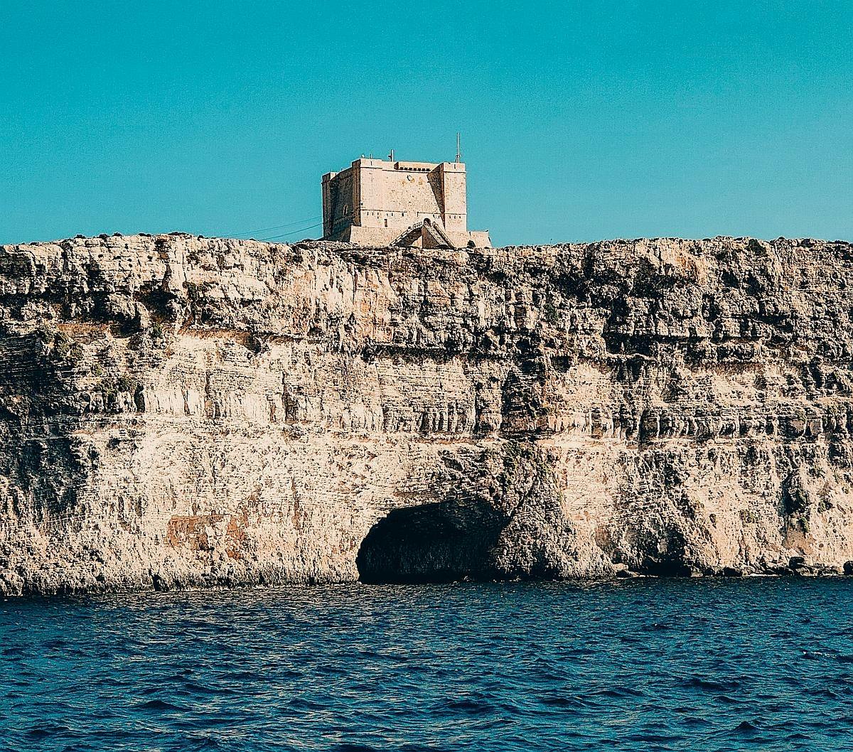 Motorboat Sunset Cruise in Comino