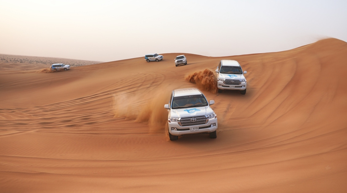 Dubai Morning Desert Safari With Dune Bashing Sandboarding Camel Ride