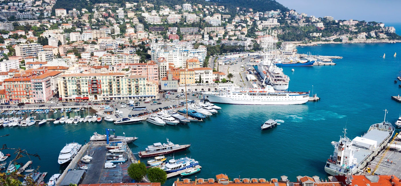 Harbour view on the French Riviera near Nice and Monaco with turquoise water and boats