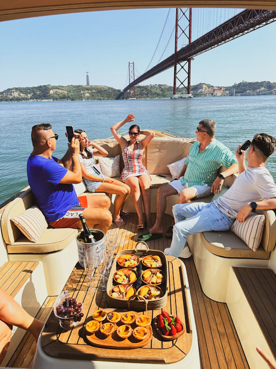 Tagus River sunset boat cruise with open bar and snacks