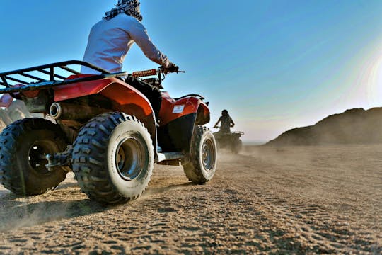 Quad sunset with barbecue and camel riding in Marsa Alam