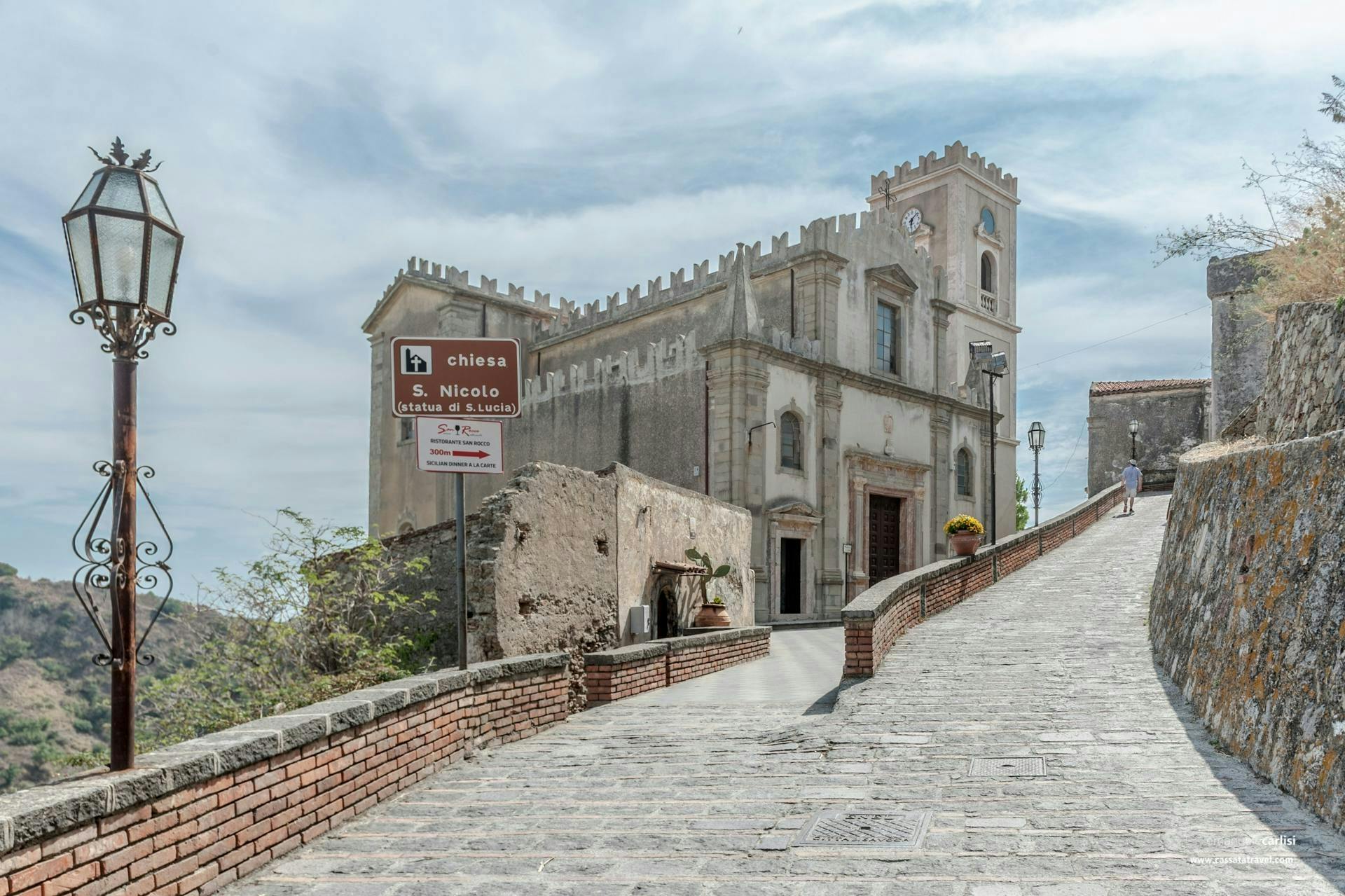 Visita guiada de meio dia ao Padrinho com traslado de Taormina