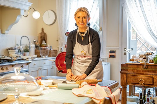 Dining experience at a local's home in Pisa with cooking demo