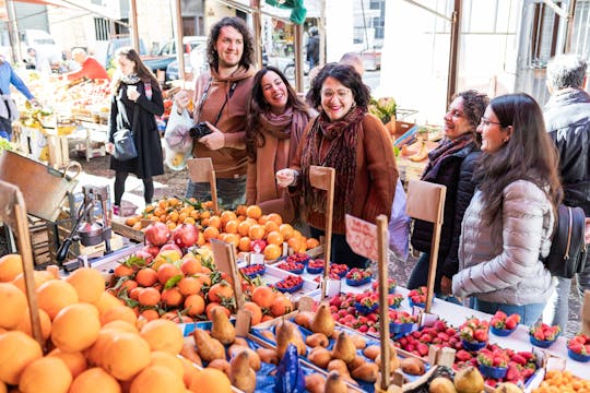 Market tour and dining experience at a Cesarina's home in Messina