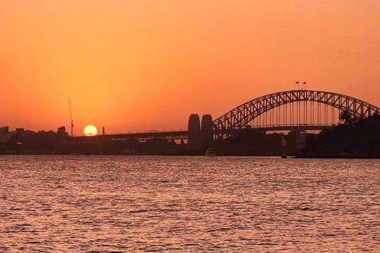 Crucero al atardecer por el puerto de Sídney con bebida de cortesía