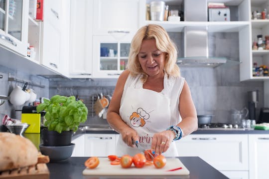 Almoço ou jantar e show de culinária na casa de uma Cesarina em Roma