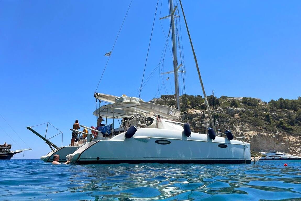 Rhodes East Coast Semi Private Catamaran Cruise with Transfer