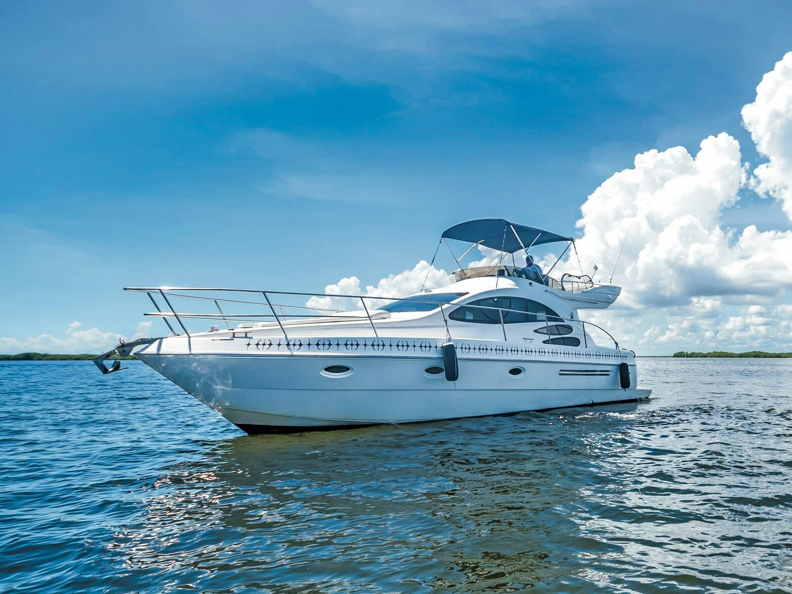 Cruise Cancun on a private yacht with crew