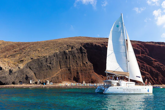 Santorini classic catamaran cruise with pick-up, lunch and drinks