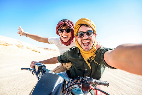 Quad sunset with barbecue and camel riding in Marsa Alam