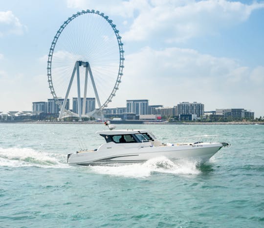 Private 36-feet yacht rental to glide in Dubai Marina