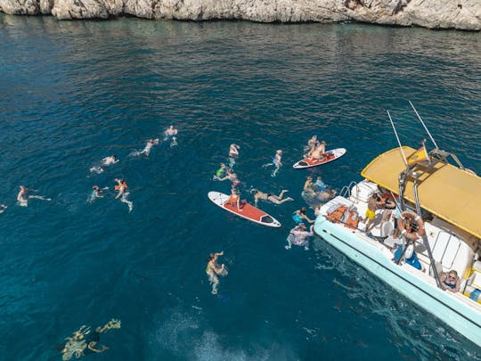 Excursión en barco a la playa de Coll Baix y sus cuevas desde Alcudia