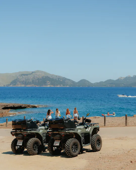 Tour in quad al tramonto a Cala San Joan