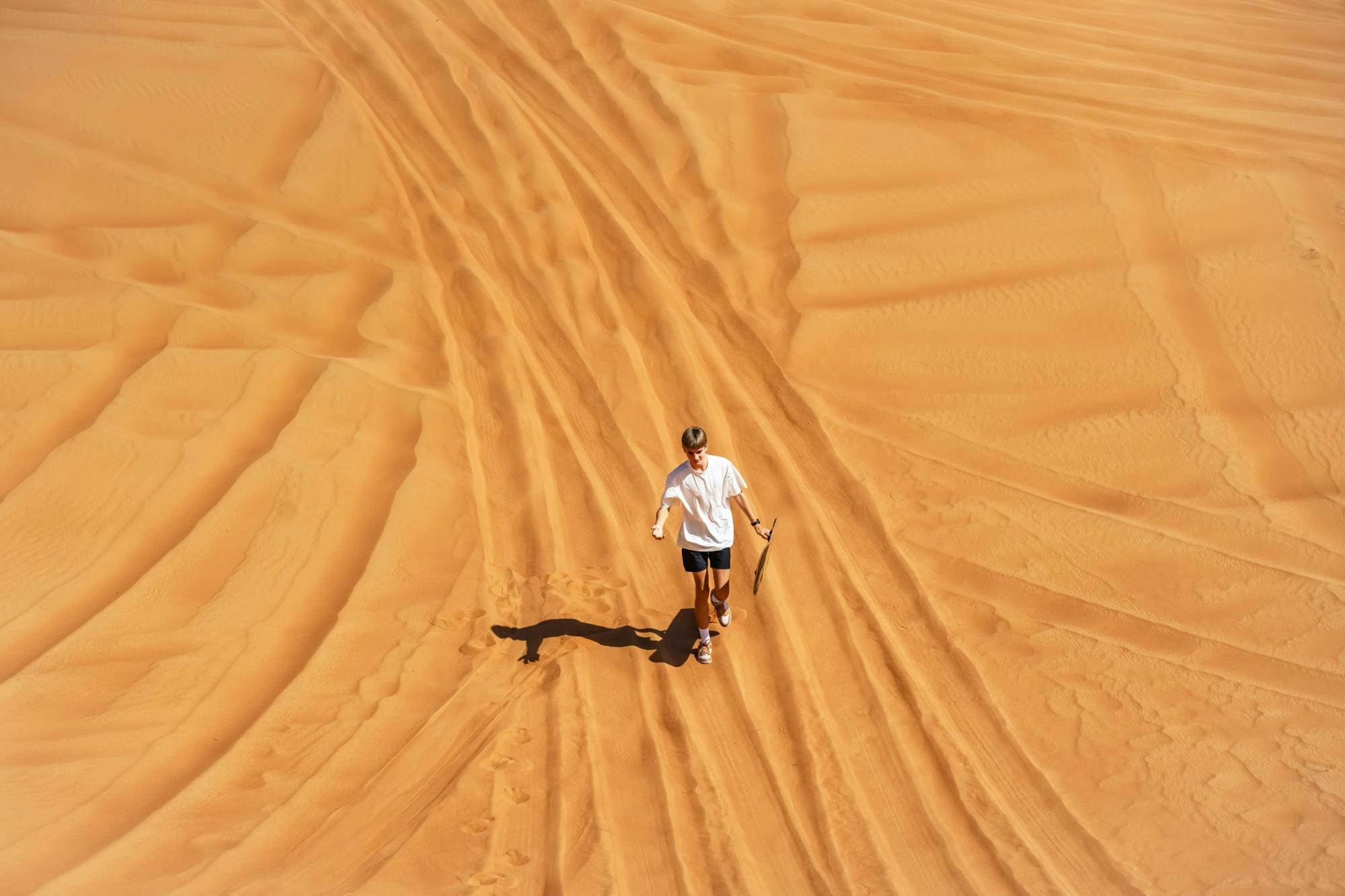 Sandboarding in den Sahara-Dünen mit Kamelritt bei Sonnenuntergang und BBQ