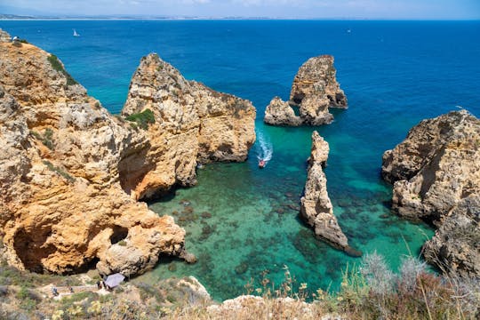 Excursión guiada de un día por el Algarve occidental en minibús privado