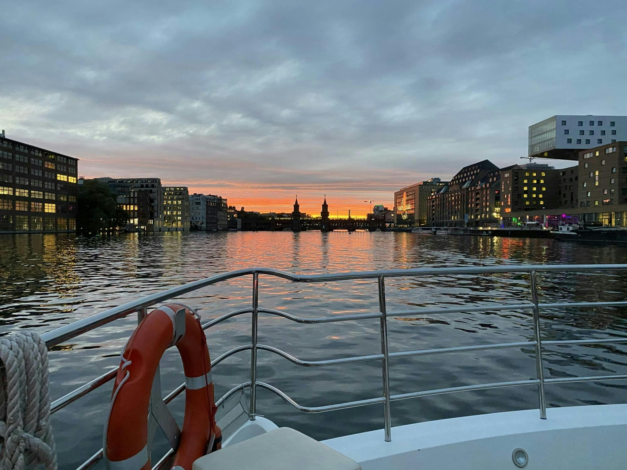 Solar-powered catamaran cruise on Berlin's Spree River at sunset