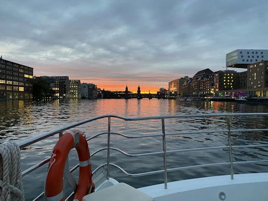 Solar-powered catamaran cruise on Berlin's Spree River at sunset