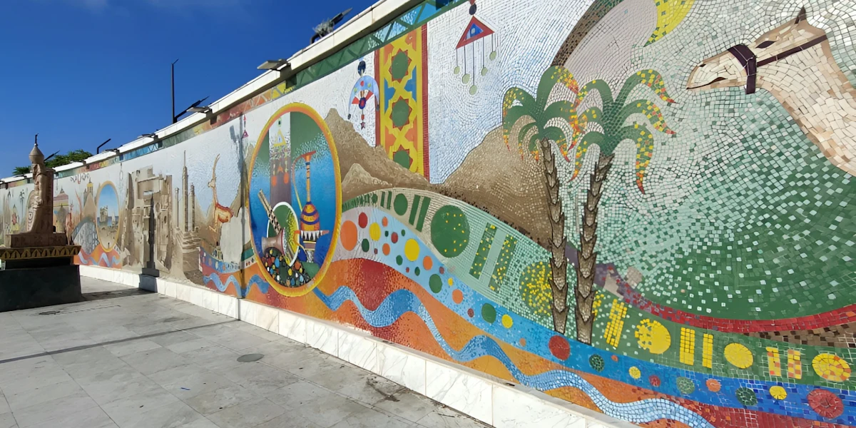 Colourful coastal mosaic artwork and promenade scene near Mersa Matruh