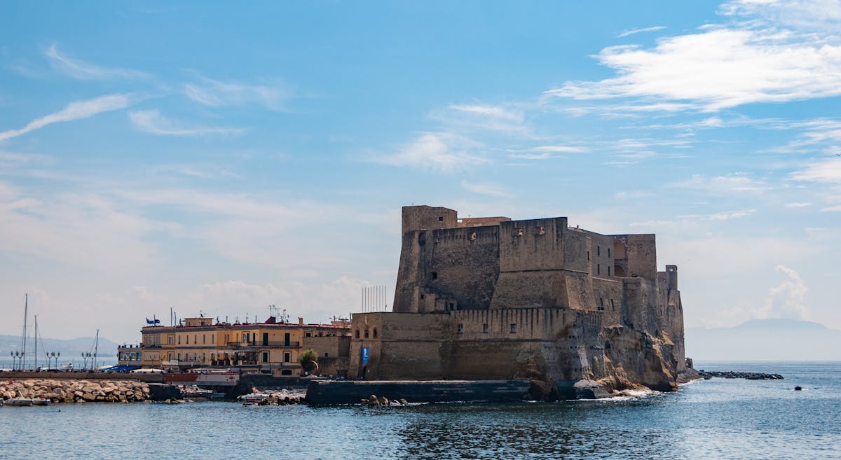 Naples coastline cruise with historic sightseeing and swimming break