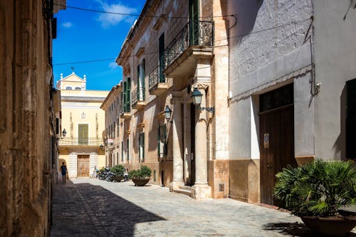 Ciutadella walking tour with shopping, El Toro visit and Casa Olivar