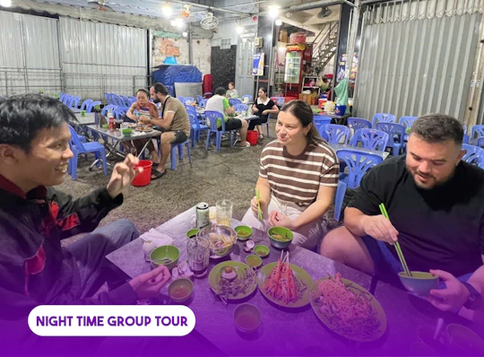 Ho Chi Minh City local food evening tour by motorbike