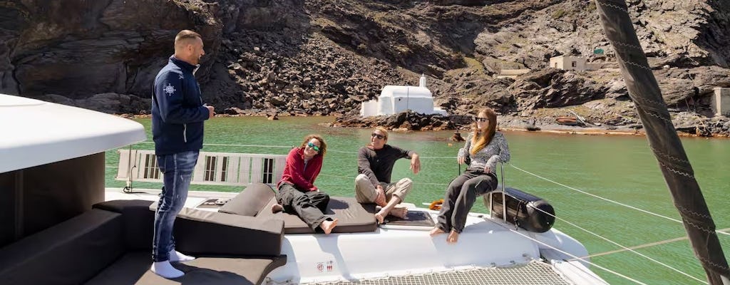 Catamaran cruise along Santorini's coastline from Fira