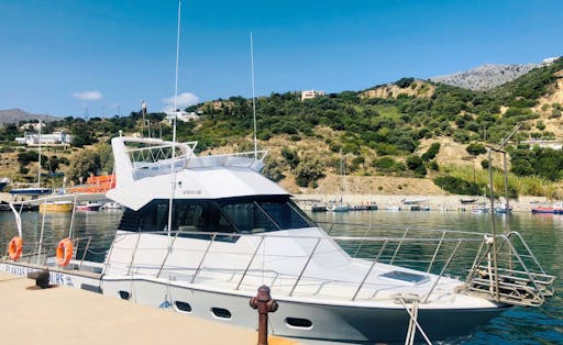 Guided tour to Preveli Palm Beach by boat with taverna lunch