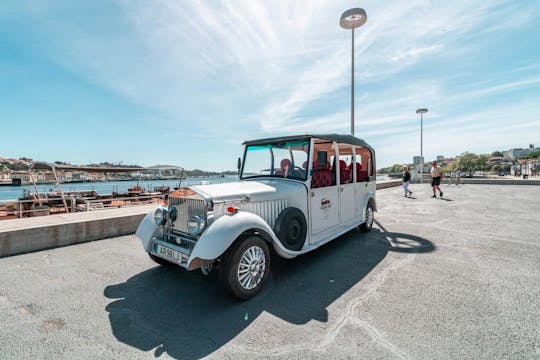Electric vehicle tour of Porto with wine tasting and river cruise