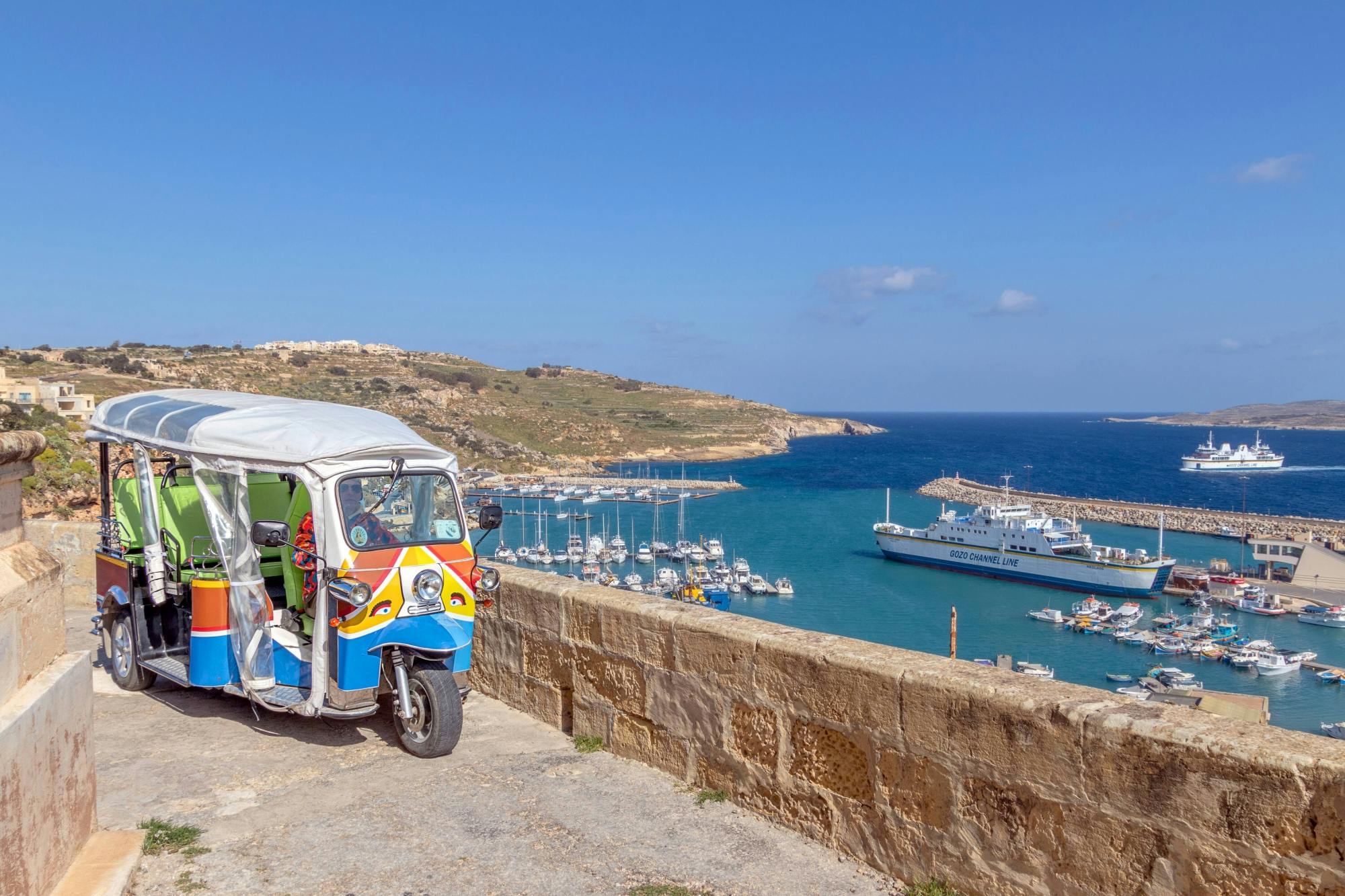 Sunset Gozo tuk-tuk and Comino Island hopper boat tour