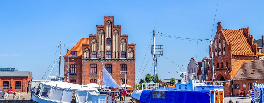 Wismar harbour scene with boats and brick architecture