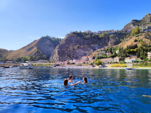 Cruise Taormina Bay in Sicily with an aperitif