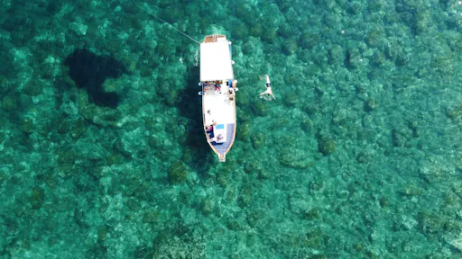 Taormina Bay cruise with wine and liqueur-tasting in Sicily