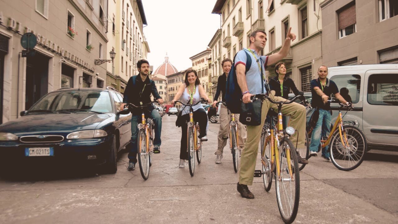 Audio guided bike tour led by a tour leader