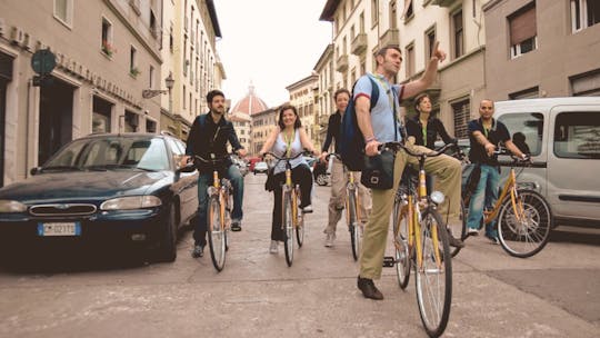 Audio guided bike tour led by a tour leader