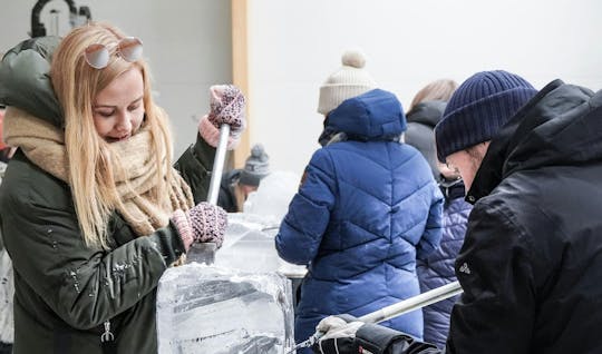 Ice sculpting workshop and dinner by the fire in Rovaniemi
