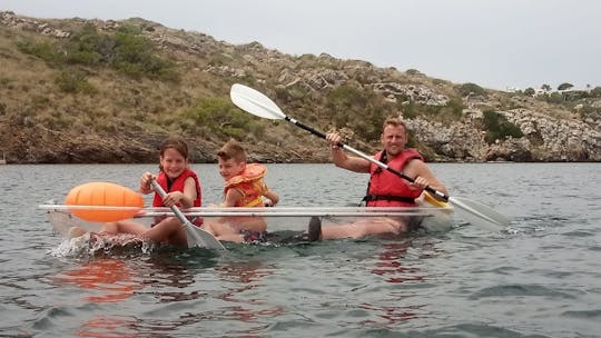 Guided transparent kayak tour in the bay of Addaia in Menorca