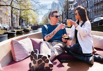 Amsterdam's canals tour with cheese and drinks tasting